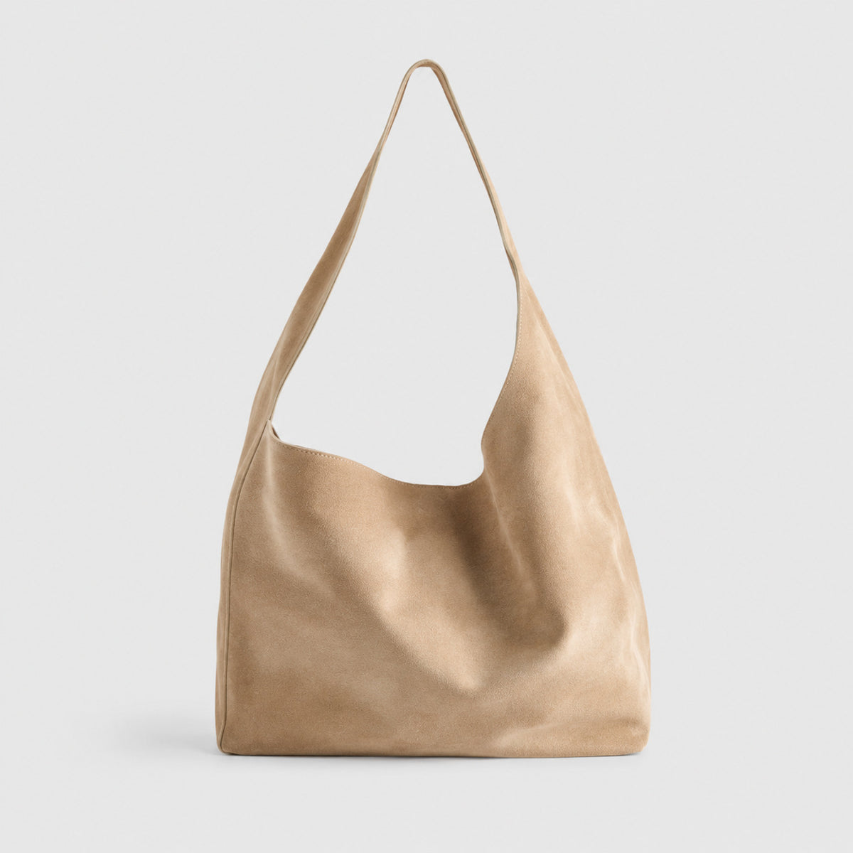 Large slouchy hobo shoulder bag in brushed suede-like finish with single flat strap and unstructured body, detail view 4