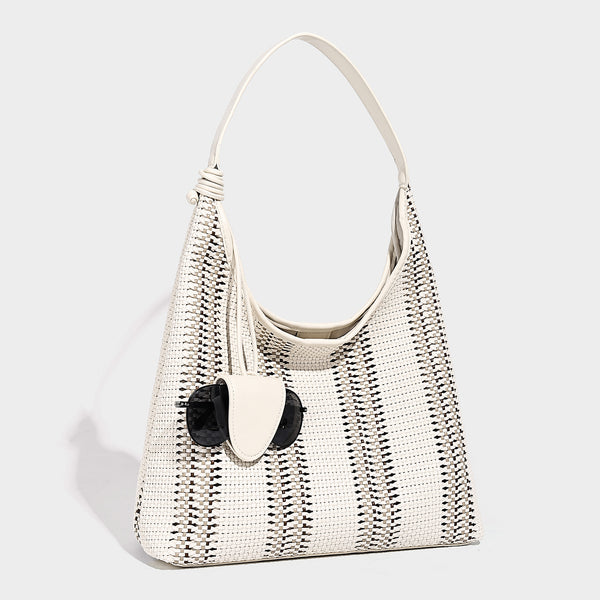 Woven striped slouch shoulder tote bag with knotted strap and attached front flap pouch, detail view 13