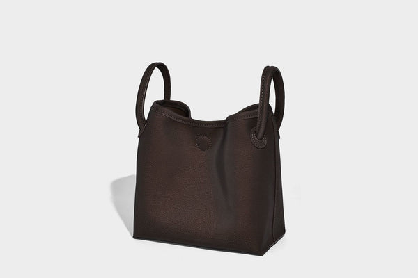Small structured matte pebbled tote bag with twin top handles and removable zip pouch, detail view 17