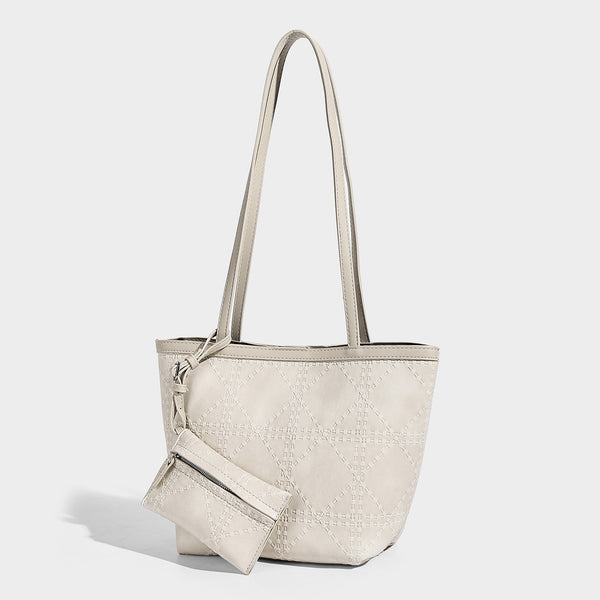 Quilted diamond-pattern tote bag with attached front zip pouch and long shoulder straps, detail view 3