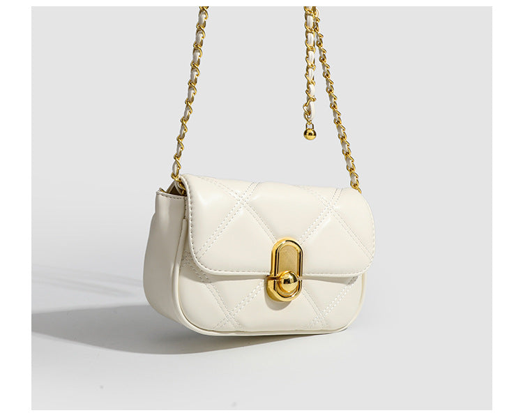 Compact diamond-quilted mini crossbody bag with gold-tone turn-lock closure and woven chain strap, detail view 12