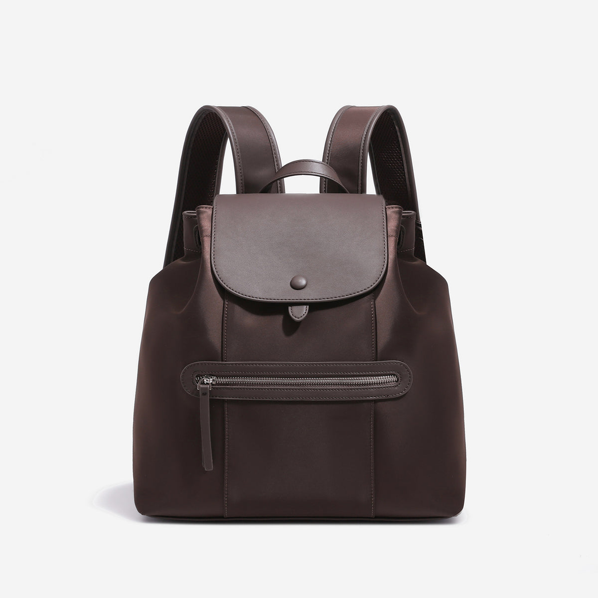 Large flap-top nylon backpack with leather-look trim, snap closure, front zip pocket, and padded shoulder straps, detail view