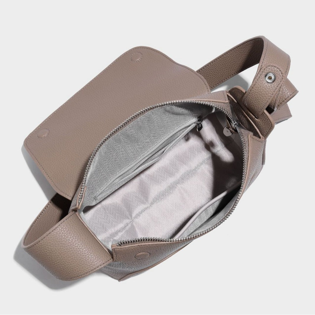 Structured curved-flap pebbled PU shoulder bag with sculptural loop strap detail, detail view 3