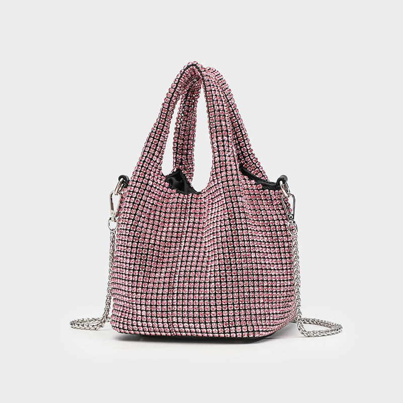 Small all-over rhinestone crystal bucket bag with twin handles and detachable chain shoulder strap, detail view 2