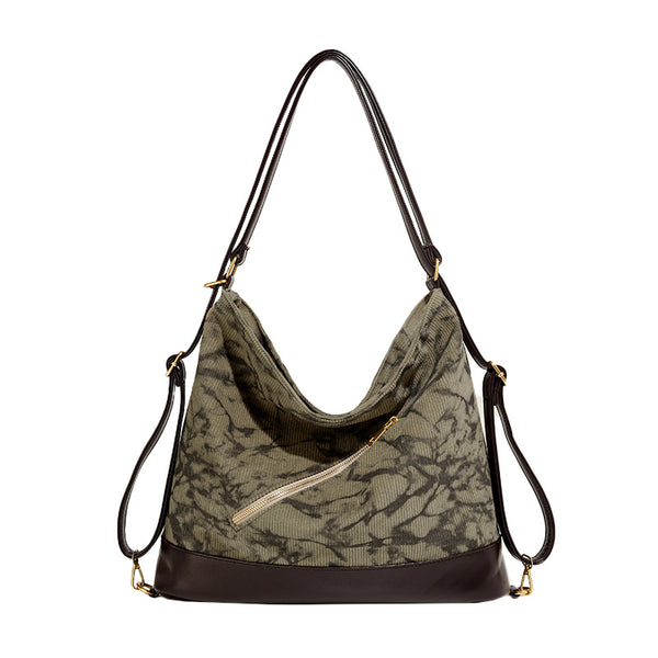 Large ink-wash printed corduroy hobo bag with dark brown leather-look base trim, diagonal front zip pocket, and gold-tone