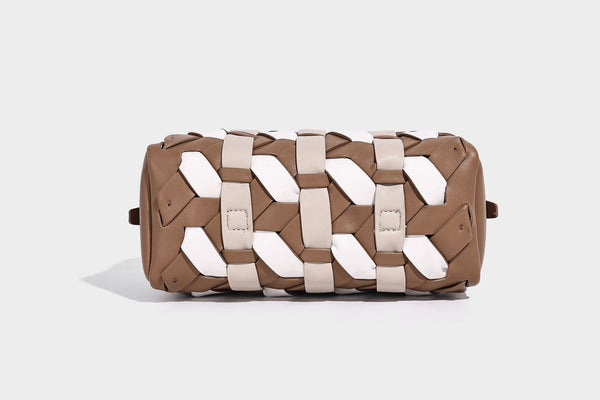 Small structured satchel bag with two-tone woven front panel, dual top handles, and detachable crossbody strap in tan brown