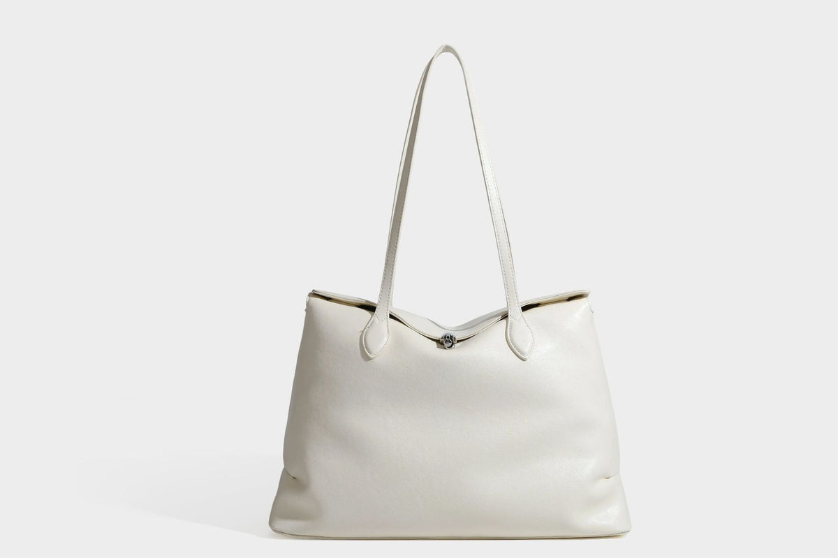 Large leather-look tote shoulder bag with slim double straps and silver-tone turn-lock closure, detail view 23