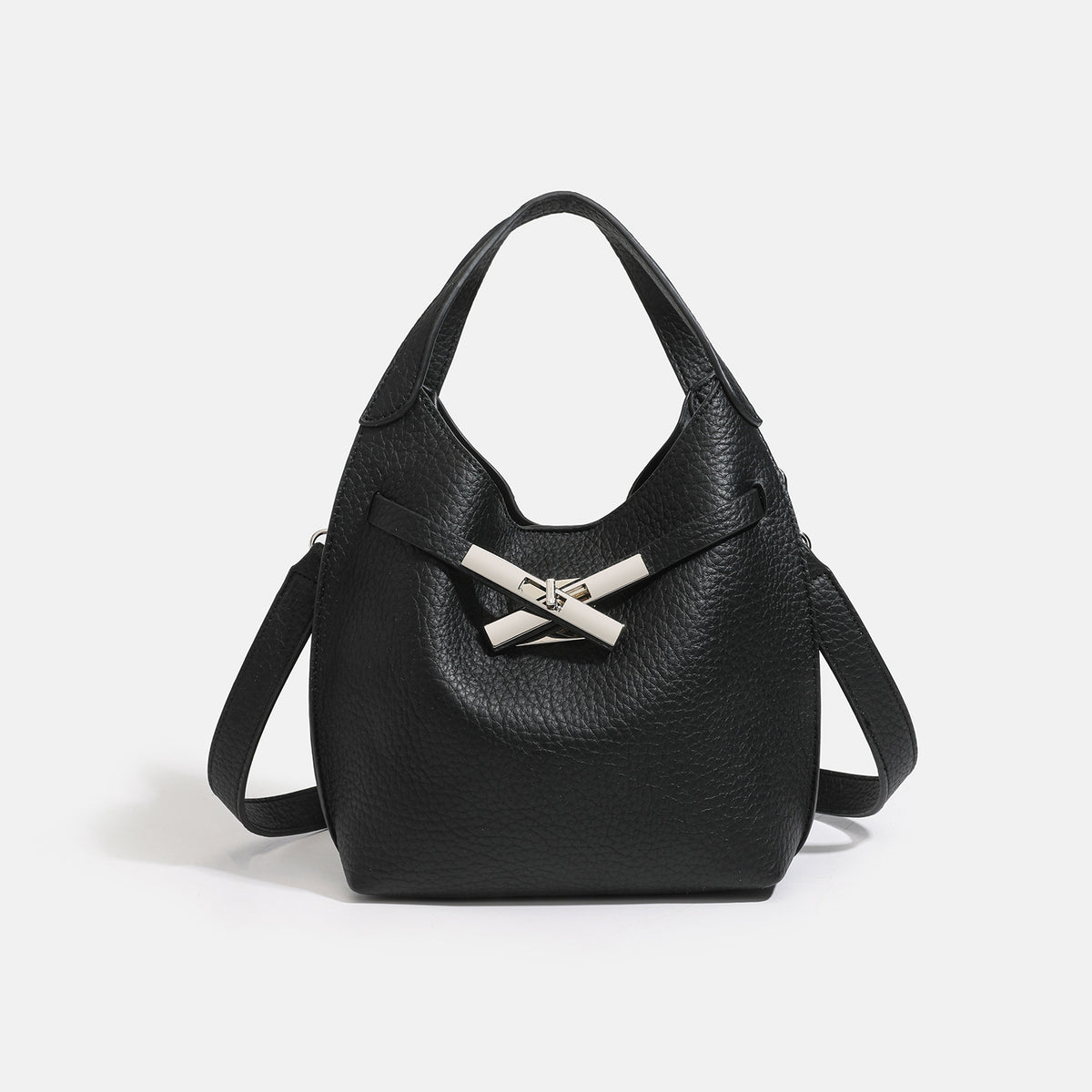 Compact pebbled leather-look shoulder bag with crossed silver-toned metal front closure, short top handle, and long, detail