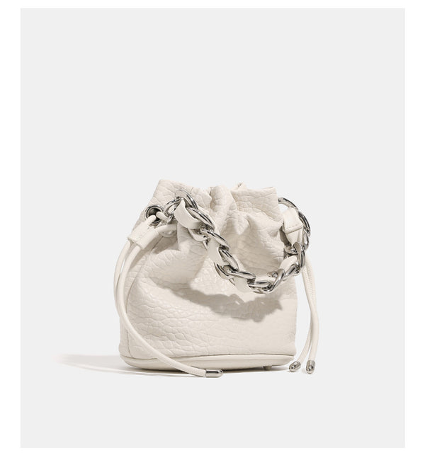 Mini pebbled leather-look bucket bag with chunky silver-tone chain handle and drawstring closure, detail view 11
