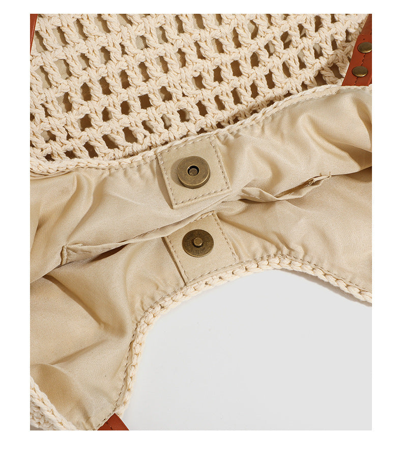 Open-knit woven tote bag with leather-look shoulder straps and brass-tone hardware in off-white, detail view 14