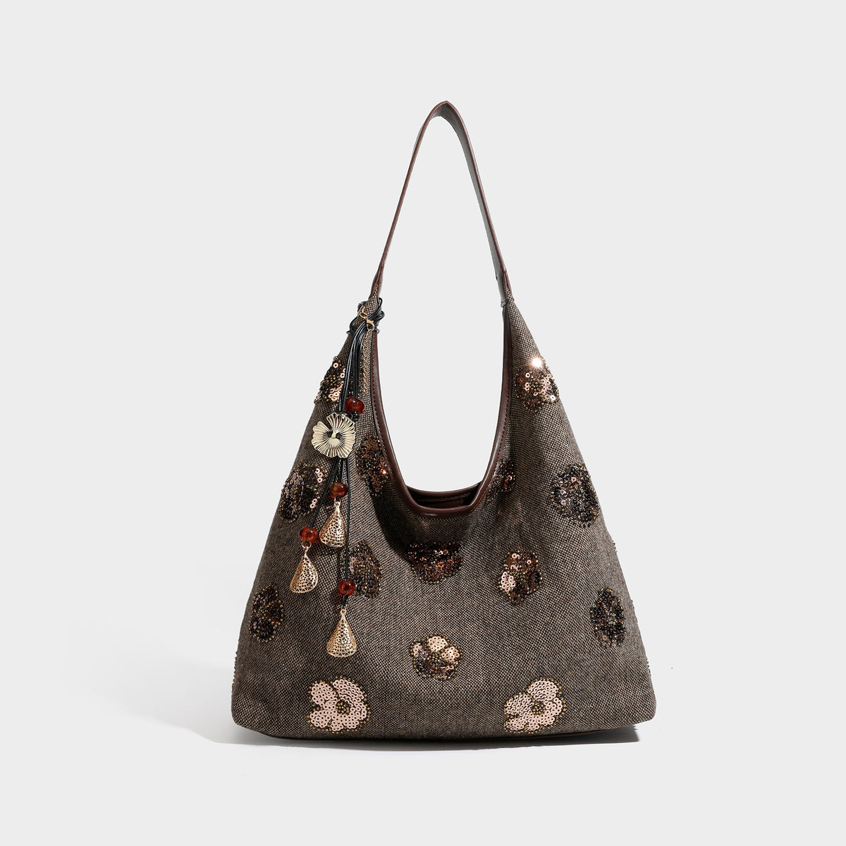 Lässige Trapez-Schulter-Tote in Anthrazit mit floralen Motiven aus silberfarbenen Pailletten, Trageriemen in Lederoptik und herabhängendem, perlenverziertem