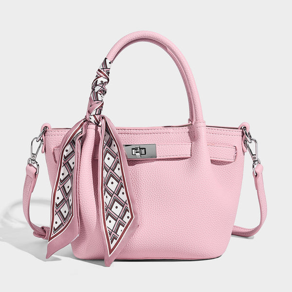 Kleine strukturierte Henkeltasche aus genarbtem Material in Taupe mit zwei Henkeln, bedrucktem Schalband, vorderem Drehverschluss und, Detailansicht