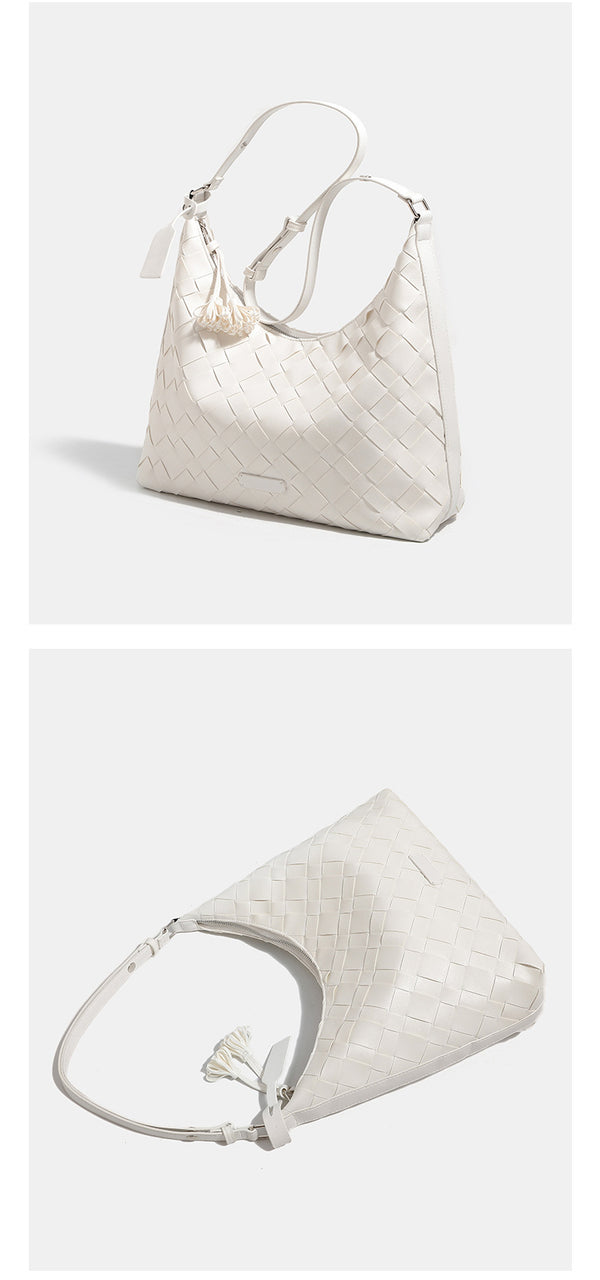 Large woven checker hobo shoulder bag with slim strap, silver-tone hardware, and braided tassel zipper pull, detail view 12