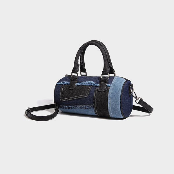 Mini barrel handbag in light and dark denim patchwork with frayed seam trim, dual top handles, top zip closure, and, detail