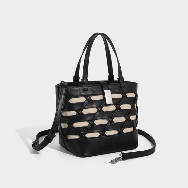 Structured woven lattice tote bag with cream lining, dual top handles, detachable crossbody strap, and silver-tone hardware