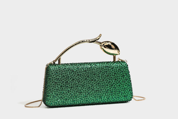 rectangular hard-case rhinestone evening clutch with sculptural gold-tone branch-and-bud top handle and detachable chain