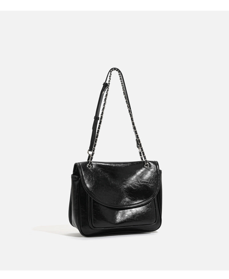 Structured glossy leather-look flap shoulder bag with silver-tone chain strap, detail view 9