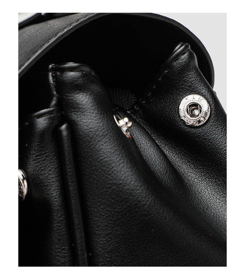 Structured black leather-look flap satchel bag with silver turn-lock hardware and top handle, detail view 25