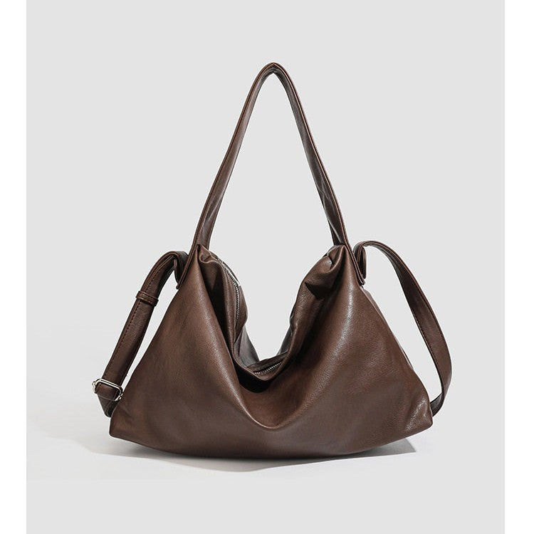 Slouchy leather-look hobo shoulder bag with top zipper and silver-tone hardware, detail view 5
