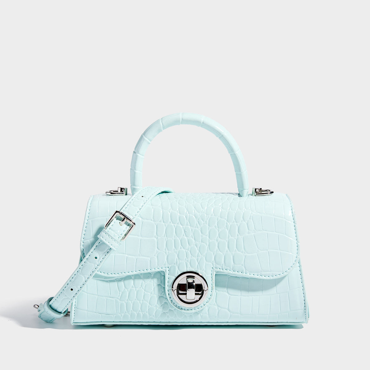 Mini croc-embossed glossy structured handbag with silver-tone turn-lock clasp and short top handle, detail view 10