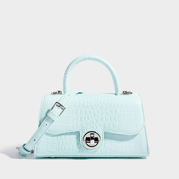 Mini croc-embossed glossy structured handbag with silver-tone turn-lock clasp and short top handle, detail view 10