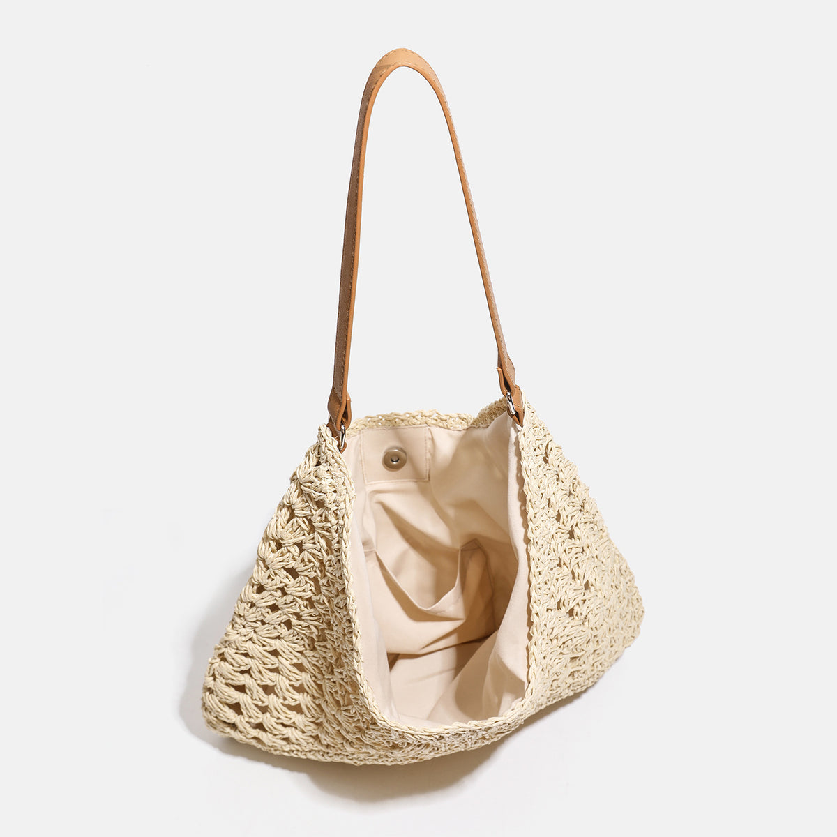 Natural ivory open-weave crochet hobo shoulder bag with tan leather-look strap and cream fabric lining, detail view 4