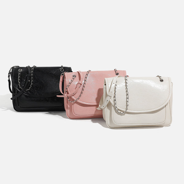 Structured glossy leather-look flap shoulder bag with silver-tone chain strap, detail view 4