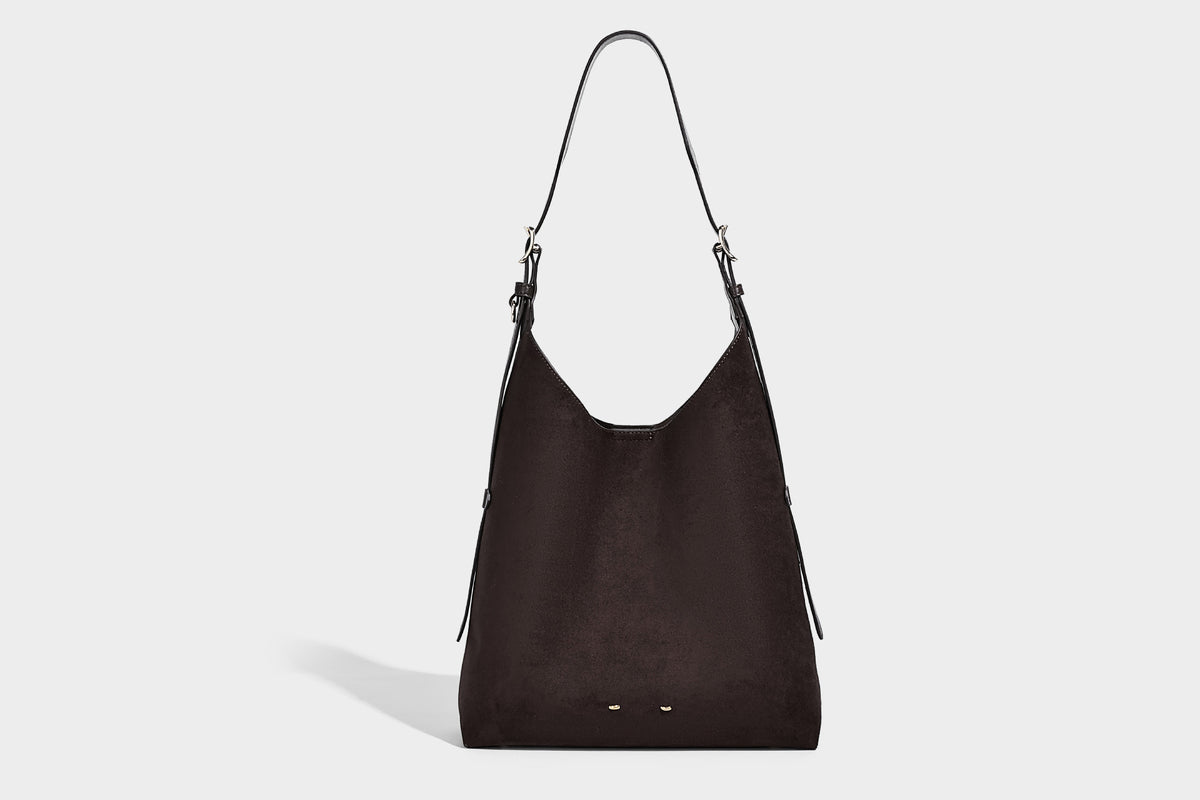 Large open-top hobo shoulder bag in tan leather-look finish with detachable zip pouch and adjustable buckle strap, detail