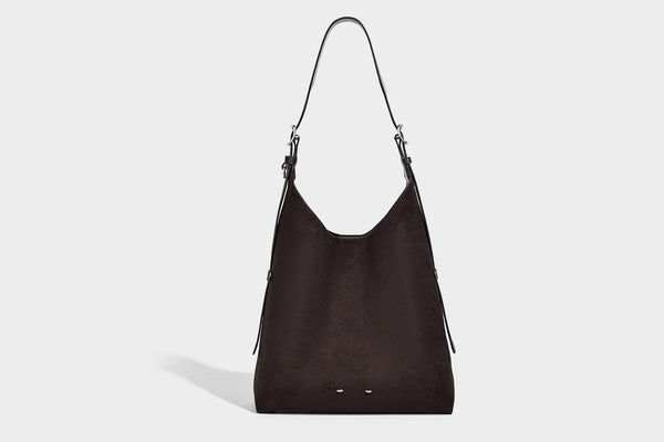 Large open-top hobo shoulder bag in tan leather-look finish with detachable zip pouch and adjustable buckle strap, detail