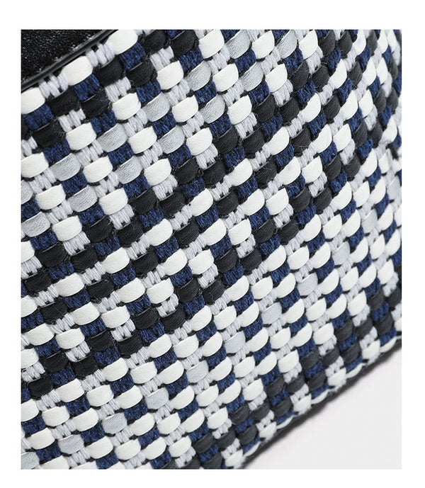 Small structured woven checker bucket bag with braided top handle, drawstring closure, and silver-tone hardware in black
