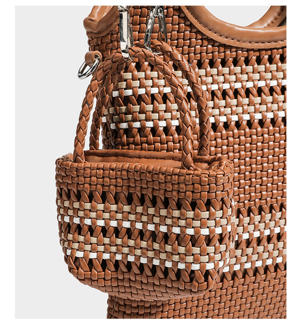 Brown two-tone woven leather-look shoulder bag with braided top handles, detachable mini pouch, and adjustable crossbody