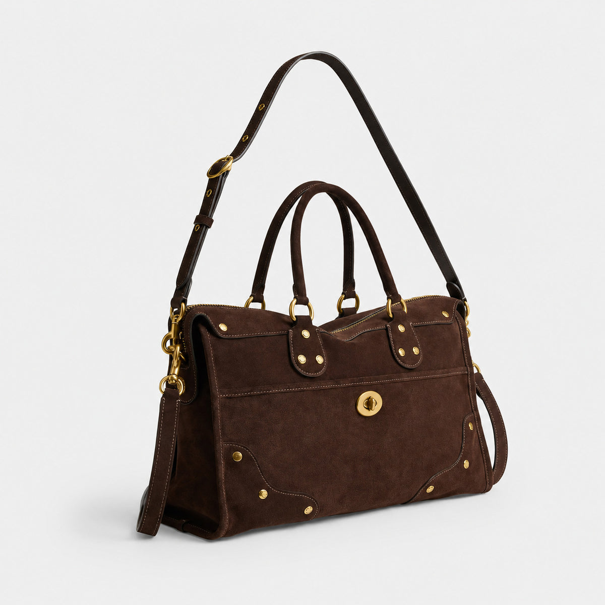 Strukturierte Satchel-Bag mit matter Velourslederoptik in Dunkelbraun, goldfarbenen Nieten, Drehverschluss und zwei abgerundeten Tragegriffen
