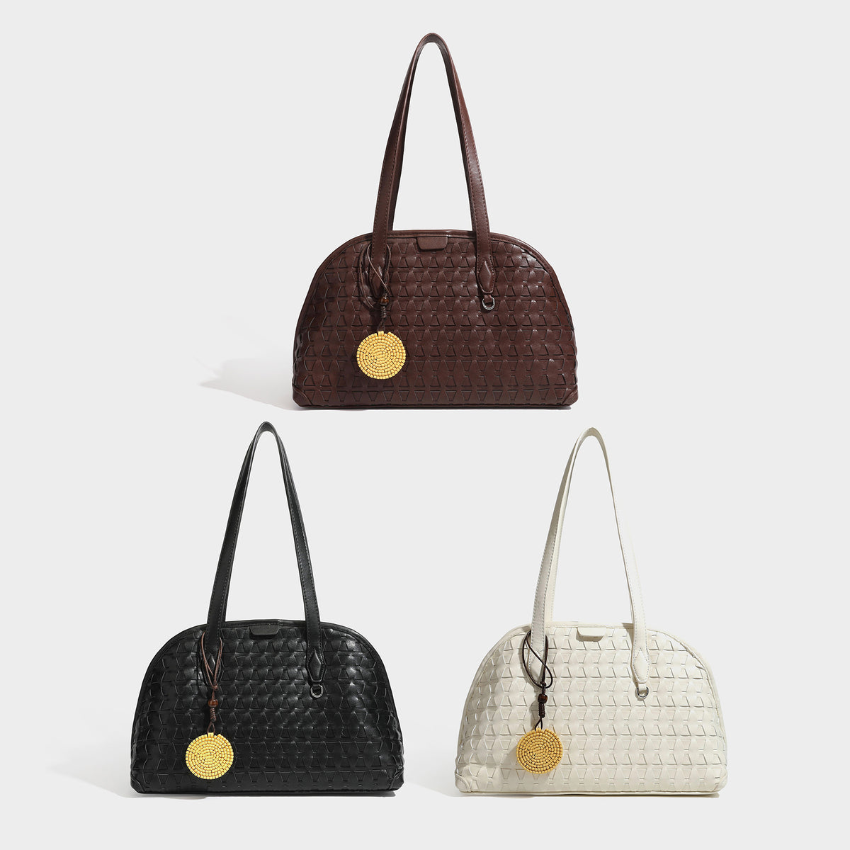 Strukturierte, kuppelförmige Schultertasche im Shopper-Stil mit geometrischer Webstruktur in Lederoptik, langen Doppelriemen, Reißverschluss oben und rund