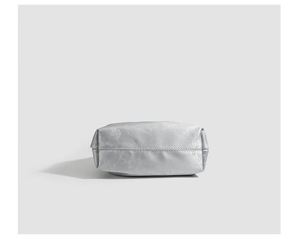 Small ruched drawstring pouch bag with pearl-bead handle and silver-tone chain strap, detail view 11