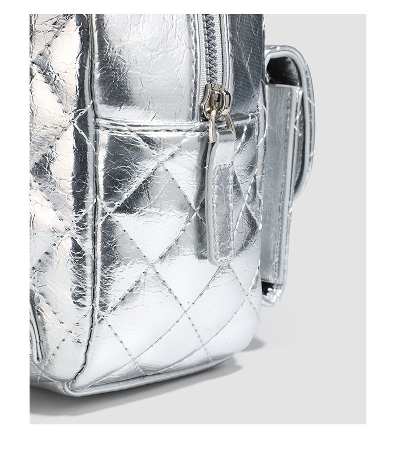 Quilted leather-look backpack purse with chain strap and turn-lock front pocket, detail view 20