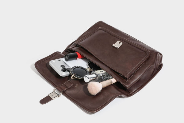 Structured rectangular satchel bag in dark espresso brown with smooth leather-look finish, flap front with silver turn-lock