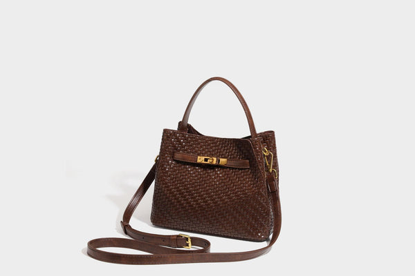 Structured woven leather-look bucket bag with gold-tone turn-lock hardware and detachable shoulder strap, detail view 32