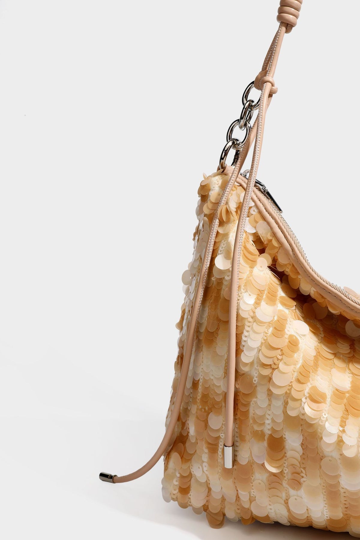 Slouchy paillette sequin hobo shoulder bag with zip closure and adjustable leather-look strap with silver chain hardware