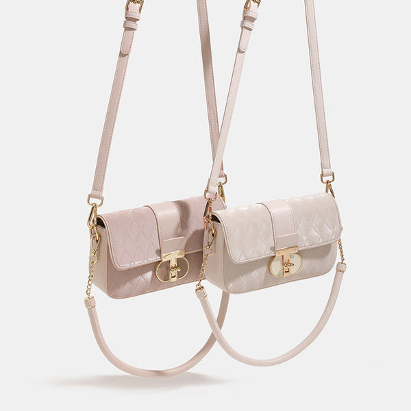 Compact quilted flap crossbody bag with gold turn-lock clasp and adjustable shoulder strap, detail view 2