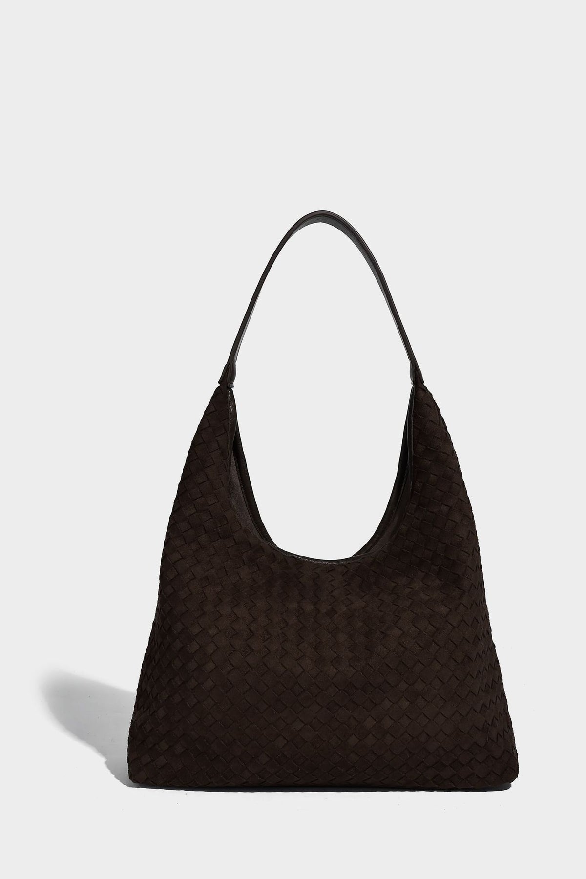 Large slouchy woven hobo tote bag with curved shoulder strap and triangular silhouette, detail view 15