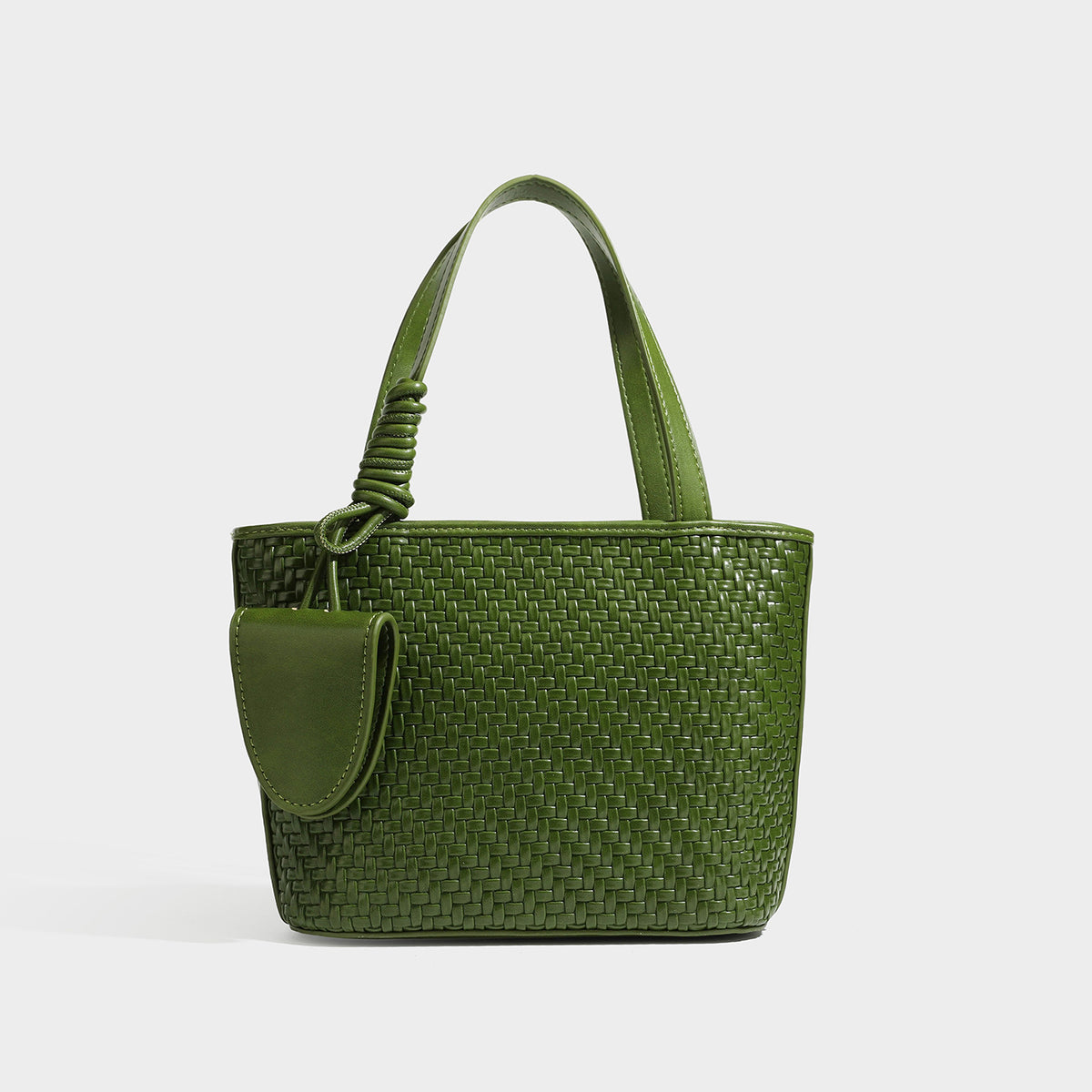Strukturierte Tote-Bag mit Webstruktur in Braun und goldfarbenen Beschlägen, mit Seil umwickelten Tragegriffen, kleiner Fronttasche sowie, Detailansicht