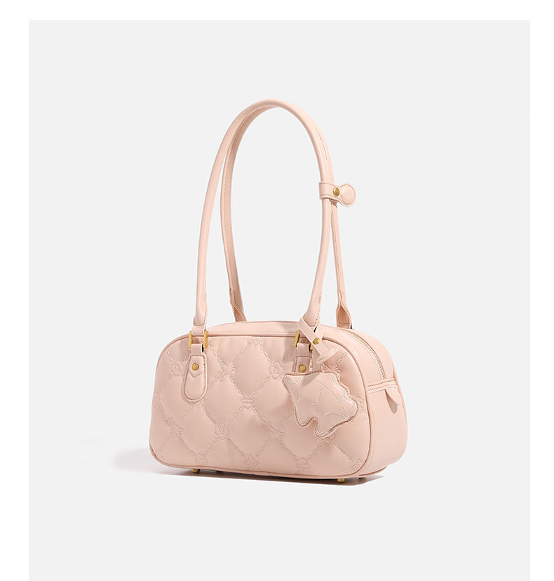 Small structured quilted leather-look zip shoulder bag with gold-tone hardware and adjustable strap, detail view 11
