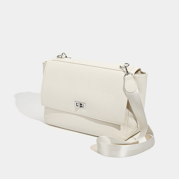Large structured pebbled-finish flap shoulder bag with silver turn-lock closure and adjustable strap, detail view 3
