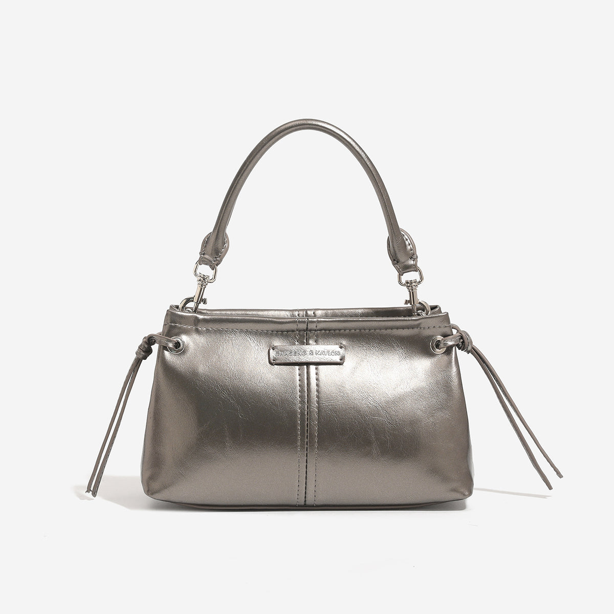 Compact retro mini shoulder bag with crinkled leather-look finish, drawstring side detail, and silver-tone hardware, detail