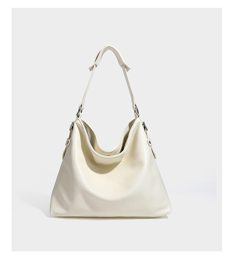 Large slouchy hobo shoulder bag in dark brown with smooth leather-look finish, adjustable strap, and silver-tone hardware