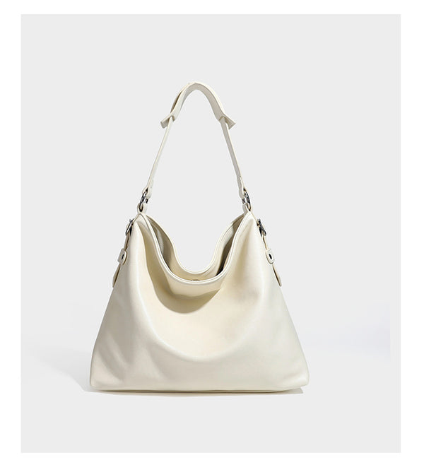Large slouchy hobo shoulder bag in dark brown with smooth leather-look finish, adjustable strap, and silver-tone hardware