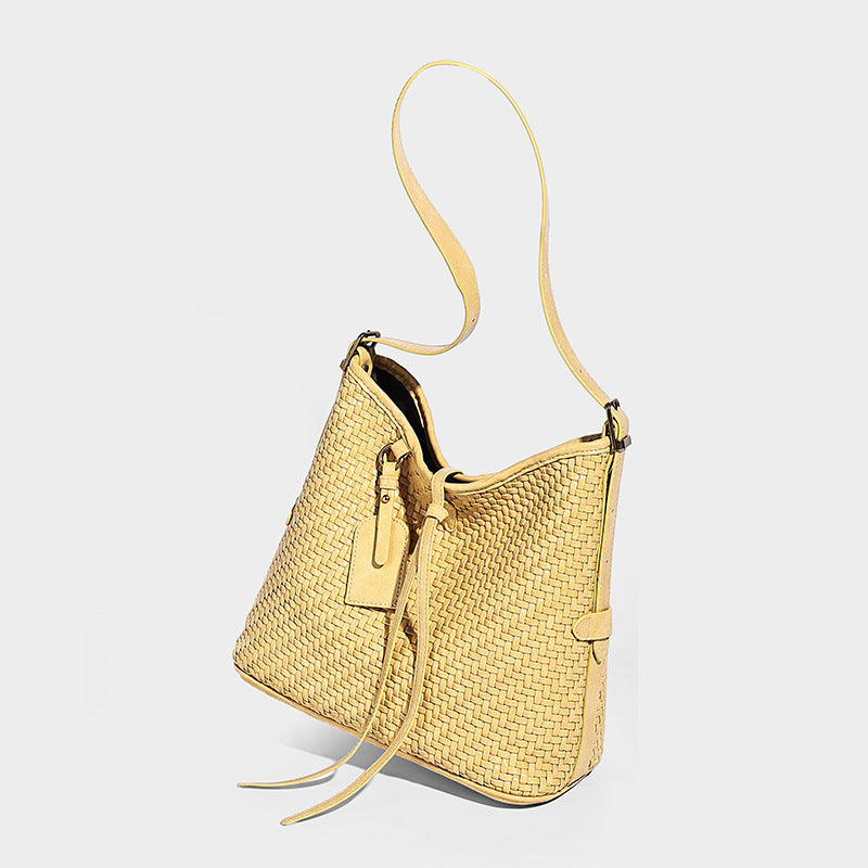 Slouchy woven-texture bucket shoulder bag with tassel tie closure and gold-tone hardware, detail view 13