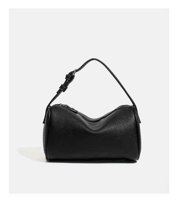 Kompakte Schultertasche in genarbter Lederoptik mit Reißverschluss oben, geknotetem Tragegriff und verstellbarem Crossbody-Riemen, Detailansicht