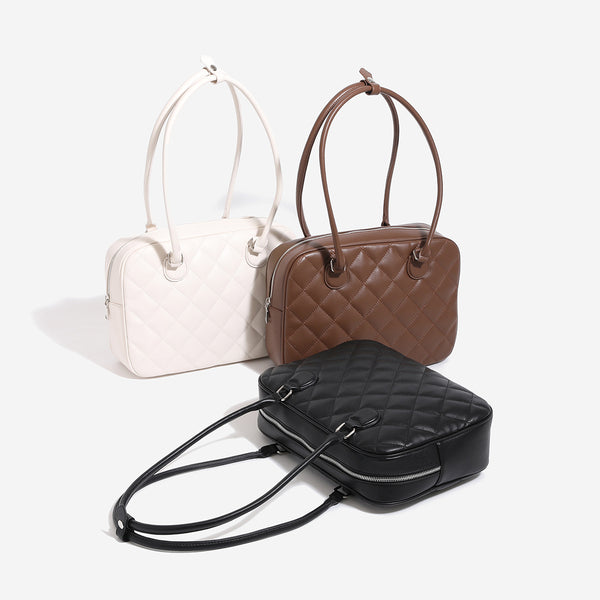Structured diamond-quilted bowling shoulder bag with silver-tone hardware and top zip closure, detail view 2