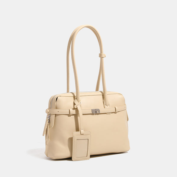 Structured leather-look zip-top tote satchel with twin handles, front turn-lock strap, hanging ID tag, and silver-tone